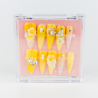 Buy  Aurora Bloom press on nails in Almond shape, Holiday, Party theme, yellow colour and Long length.
