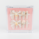 Buy Bara Hime press on nails in Almond shape, Holiday, Party theme, beige colour and Long length.
