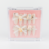 Buy Bara Hime press on nails in Almond shape, Holiday, Party theme, beige colour and Long length.
