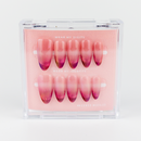 Buy Blushing Horizon press on nails in Almond shape, Holiday theme, red, nude colour and Long length.