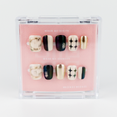 Buy Born This Way press on nails in Round shape, Party theme, Beige,black,golden colour and Medium length.
