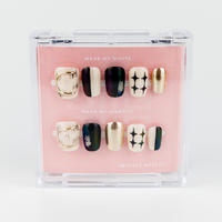 Buy Born This Way press on nails in Round shape, Party theme, Beige,black,golden colour and Medium length.
