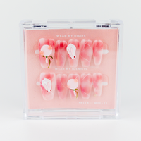 Buyy Bubblegum Bunny press on nails in Coffin shape, Holiday theme, pink colour and Long length.

