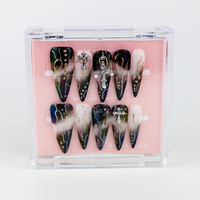 Buy Crucifix Maiden press on nails in Almond shape, Party theme, black,nude colour and Long length.
