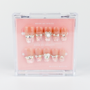Buy Crystal Heart press on nails in Coffin shape, Party theme, nude,peach colour and Short length.
