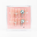 Buy  Diamond Dream press on nails in Coffin shape, Party, Brights, Casual theme, peach colour and Long length.
