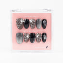 Buy Dawn Dusk Till Dawn press on nails in Oval shape, Party theme, Black colour and Long length.
