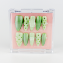 Buy EEmerald Mist press on nails in Almond shape, Party, Holiday theme, Green colour and Long length.
