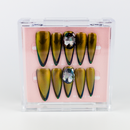 Buy Emerald stone press on nails in Almond shape, Party theme, Black,green colour and Long length.
