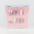 Buy Euphoria press on nails in Oval shape, Party theme, Purple colour and Medium length.
