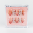 Buy Glimmer Blush press on nails in Squaoval shape, Party, Holiday theme, peach colour and Long length.
