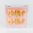 Buy  Gold N Bloom press on nails in Coffin shape, Party, Holiday theme, gold,white,nude colour and Long length.
