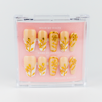 Buy  Gold N Bloom press on nails in Coffin shape, Party, Holiday theme, gold,white,nude colour and Long length.
