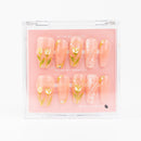 Buy  Golden Spring press on nails in Coffin shape, Brights, Holiday, Party theme, Nude colour and Long length.
