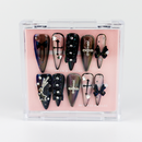 Buy Gothic Barbie press on nails in Almond shape, Party theme, Nude,black colour and Long length.
