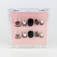 Buy  Hearthrob press on nails in Round shape, Casual theme, Black,nude colour and Short length.
