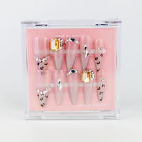 Buy  Hot Shot press on nails in Almond shape, Party theme, pink,silver colour and Long length.
