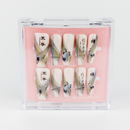 Buy Koan Serenity press on nails in Coffin shape, Brights, Holiday theme, Beige colour and Long length.
