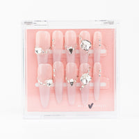 Buy  Lovecrystal press on nails in Coffin, Almond shape, Party theme, nude,peach colour and Long length.
