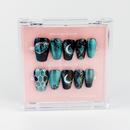 Buy Lunar Eclipse press on nails in Coffin shape, Party theme, Green, Black colour and Medium length.
