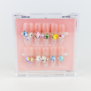 Buy Lustre Bloom press on nails in Oval shape, Party theme, pink colour and Long length.
