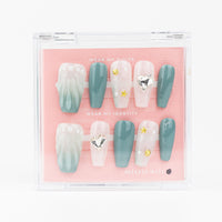 Buy Mermaid's Secret press on nails in Coffin shape, Holiday theme, green, nude colour and Medium length.