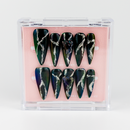 Buy Midnight Muse press on nails in Almond shape, Party theme, Green,Silver colour and Long length.

