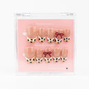 Buy Moosy  press on nails in Coffin shape, Holiday theme, white,beige,brown colour and Medium length.

