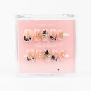 Buy Nude Botanica press on nails in Square shape, Party theme, nude, black colour and Short length.