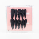 Buy  Parsel Witch press on nails in Almond shape, Party theme, Black colour and Long length.
