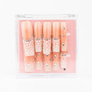 Buy  Pearl Pop press on nails in Square shape, Party theme, Peach colour and Long length.
