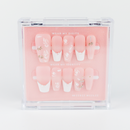 Buy Pearl Tint press on nails in Coffin shape, Holiday theme, nude,white colour and Long length.
