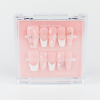 Buy Pearl Tint press on nails in Coffin shape, Holiday theme, nude,white colour and Long length.
