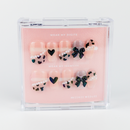 Buy Ribbons & Shadows press on nails in Squaoval shape, Party theme, nude,black colour and Long length.
