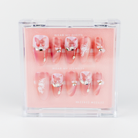 Buy  Rosewing Stardust press on nails in Round shape, Party theme, pink colour and Long length.
