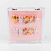 Buy  Silken Stone press on nails in Oval shape, Holiday, Party theme, Multicolour colour and Medium length.
