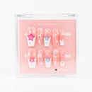 Buy Sugar Starlet press on nails in Square shape, Holiday theme, nude, white, multicolour colour and Long length.