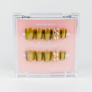 Buy Swarovista press on nails in Squaoval shape, Party theme, Green colour and Medium length.
