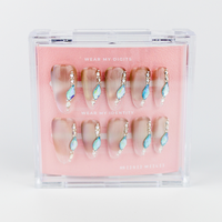 Buy Twinkle Fade press on nails in Round shape, Party theme, Beige colour and Medium length.
