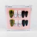 Buy  Velvet Venom press on nails in Oval shape, Party theme, green,white black colour and Long length.
