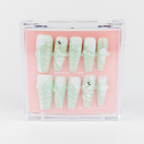 Buy Winter Vine press on nails in Coffin shape, Holiday theme, green colour and Long length.
