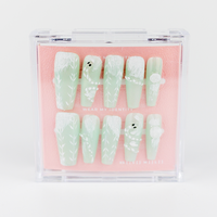 Buy Winter Vine press on nails in Coffin shape, Holiday theme, green colour and Long length.
